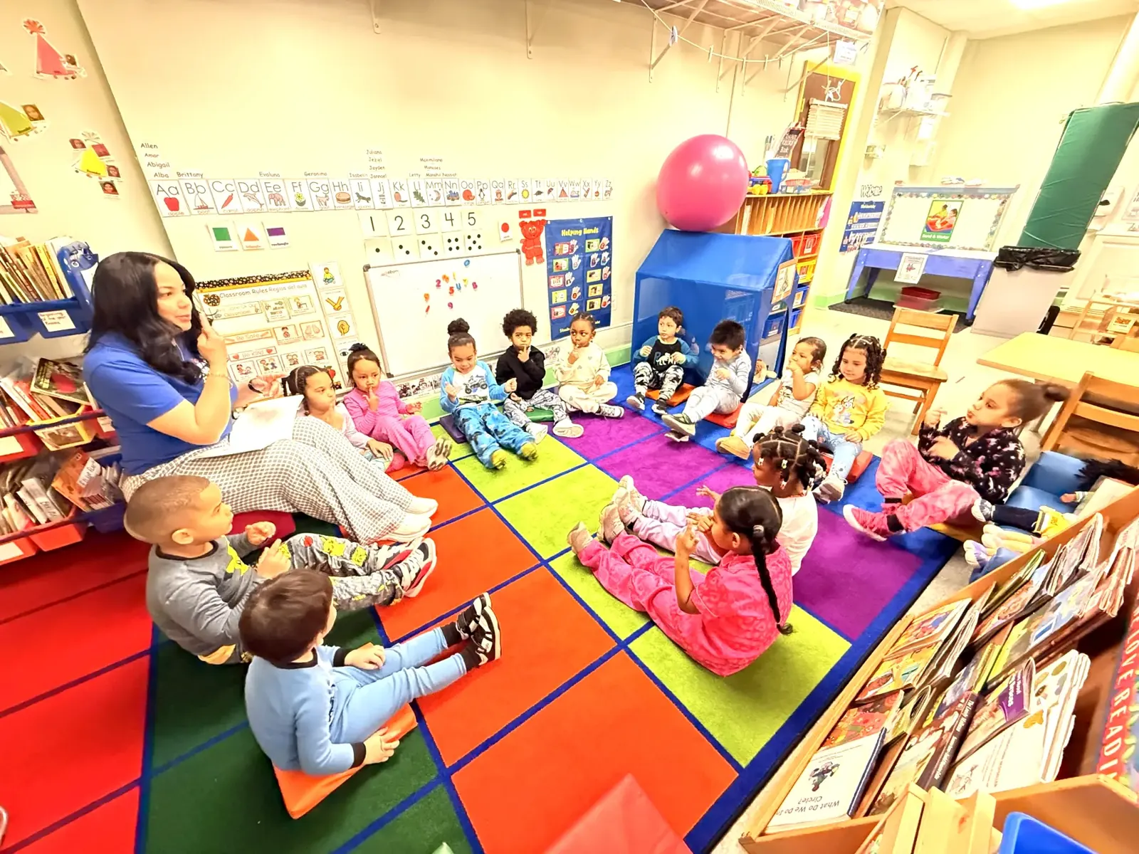Children gathered for circle time at PDC100